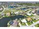 Aerial view of waterfront homes and community at 3663 Whippoorwill Blvd, Punta Gorda, FL 33950