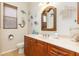 Guest bathroom with single vanity and coastal-themed decor at 3663 Whippoorwill Blvd, Punta Gorda, FL 33950