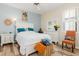 Charming bedroom with a queen-size bed and coastal accents at 3663 Whippoorwill Blvd, Punta Gorda, FL 33950