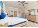 Spacious bedroom with light wood furniture and coastal accents at 3663 Whippoorwill Blvd, Punta Gorda, FL 33950