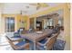 Outdoor patio with seating and view of living room at 3663 Whippoorwill Blvd, Punta Gorda, FL 33950