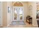 Bright and airy entryway with tile flooring and natural light at 3663 Whippoorwill Blvd, Punta Gorda, FL 33950