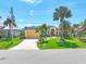 Single Gathering home with attached garage and manicured lawn at 3663 Whippoorwill Blvd, Punta Gorda, FL 33950