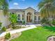 Beautiful home with landscaped yard, and a large driveway at 3663 Whippoorwill Blvd, Punta Gorda, FL 33950