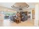 Relaxing living room with leather recliners, large TV, and access to a patio at 3663 Whippoorwill Blvd, Punta Gorda, FL 33950