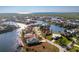 Bird's-eye view of a canal-front home in a residential community at 3932 Madrid Ct, Punta Gorda, FL 33950