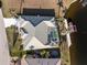 Overhead view of the home, pool, and private boat dock at 3932 Madrid Ct, Punta Gorda, FL 33950