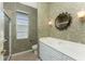 Small bathroom with single vanity and shower at 3932 Madrid Ct, Punta Gorda, FL 33950