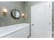 Small bathroom with single vanity and shower at 3932 Madrid Ct, Punta Gorda, FL 33950