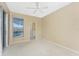 Bedroom with pool view and sliding doors at 3932 Madrid Ct, Punta Gorda, FL 33950