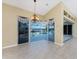 Dining room with access to pool and water view at 3932 Madrid Ct, Punta Gorda, FL 33950
