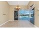 Bright dining room offering scenic pool and water views at 3932 Madrid Ct, Punta Gorda, FL 33950