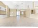 Open floor plan living area with tile flooring and high ceilings at 3932 Madrid Ct, Punta Gorda, FL 33950