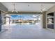 Spacious pool area with covered patio and water views at 3932 Madrid Ct, Punta Gorda, FL 33950
