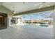Covered patio overlooking a refreshing pool and scenic waterfront at 3932 Madrid Ct, Punta Gorda, FL 33950