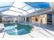 Relaxing pool and spa with covered lanai at 3932 Madrid Ct, Punta Gorda, FL 33950