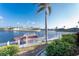 Private boat dock on a calm waterway with lush landscaping at 3932 Madrid Ct, Punta Gorda, FL 33950