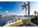 Serene canal view with private dock and lush landscaping at 3932 Madrid Ct, Punta Gorda, FL 33950