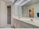 Bathroom with double vanity and shower at 4046 Lubec Ave, North Port, FL 34287