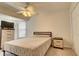 Well-lit bedroom with ceiling fan and dresser at 4046 Lubec Ave, North Port, FL 34287