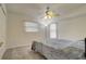 Cozy bedroom with ceiling fan and ample closet space at 4046 Lubec Ave, North Port, FL 34287