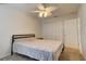 Bedroom with ceiling fan and plenty of closet space at 4046 Lubec Ave, North Port, FL 34287