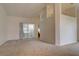 Spacious living room with high ceilings and neutral carpeting at 4046 Lubec Ave, North Port, FL 34287