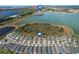 Aerial view of community, showing home location, nearby lake, and recreational amenities at 42115 Edgewater Dr, Punta Gorda, FL 33982