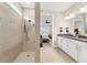 Spa-like bathroom with walk-in shower and double vanity at 42115 Edgewater Dr, Punta Gorda, FL 33982