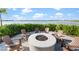 Enjoy the lake view from this community fire pit at 42115 Edgewater Dr, Punta Gorda, FL 33982
