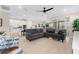 Open concept living room with kitchen view at 42115 Edgewater Dr, Punta Gorda, FL 33982