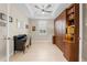Home office with built-in wall bed and ample shelving at 42115 Edgewater Dr, Punta Gorda, FL 33982