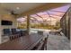 Relaxing pool area with patio furniture and screened enclosure at 42115 Edgewater Dr, Punta Gorda, FL 33982