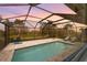 Enjoy the sunset view from this screened pool area at 42115 Edgewater Dr, Punta Gorda, FL 33982