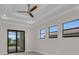 Bright bedroom with sliding glass doors leading to a patio at 4218 Vasco St, Punta Gorda, FL 33950