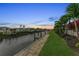 Scenic waterfront property at sunset, showcasing a private dock and canal access at 4218 Vasco St, Punta Gorda, FL 33950
