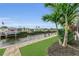 Landscaped backyard oasis with canal access and private dock at 4218 Vasco St, Punta Gorda, FL 33950