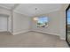 Bright dining room with large window and modern chandelier at 4218 Vasco St, Punta Gorda, FL 33950