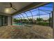 Enclosed pool and spa with patio and water view at 4218 Vasco St, Punta Gorda, FL 33950