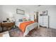 Serene bedroom with a cozy bed and an ensuite bathroom at 43620 Sparrow Dr, Punta Gorda, FL 33982