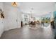 Bright and airy entryway with view into dining room and living room at 43620 Sparrow Dr, Punta Gorda, FL 33982