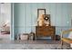 Entryway with a rustic wooden dresser and decorative accents at 43620 Sparrow Dr, Punta Gorda, FL 33982