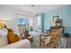 Living area with sliding glass doors leading to a private patio at 43620 Sparrow Dr, Punta Gorda, FL 33982