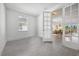 Bright office with French doors opening to the dining room at 43620 Sparrow Dr, Punta Gorda, FL 33982