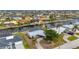 Aerial view of canal-front home with large lot and boat dock at 450 Capri Isles Ct, Punta Gorda, FL 33950