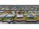 Canal-front home with pool and private dock, aerial view at 450 Capri Isles Ct, Punta Gorda, FL 33950
