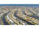 Bird's-eye view of house and surrounding canal-side community at 450 Capri Isles Ct, Punta Gorda, FL 33950