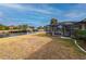 Spacious backyard with canal views and dock access at 450 Capri Isles Ct, Punta Gorda, FL 33950