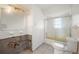 A bathroom with a shower/tub combo and a toilet at 450 Capri Isles Ct, Punta Gorda, FL 33950