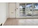 Living room with tile flooring and large window at 450 Capri Isles Ct, Punta Gorda, FL 33950
